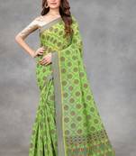 Green woven silk blend saree with blouse