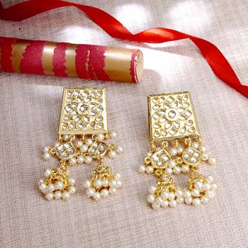 Gold pearl earrings 1