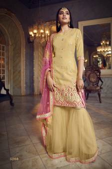 Beige Colored Thread Embroidered With Foil Mirror Work Organza Gharara Type Sharara Suit For Festive