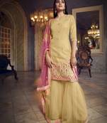 Beige Colored Thread Embroidered With Foil Mirror Work Organza Gharara Type Sharara Suit For Festive