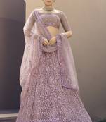 Ravishing Mauve Purple Thread And Sequins Embroidered Net fabric indian designer wedding lehenga choli dress