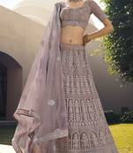 Spellbinding Mauve Purple Dori and Sequins embroidered net fabric Lehenga choli for party
