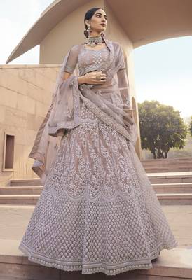 Enthralling Lilac Thread ans sequins embroidered net fabric  Lehenga designs 1
