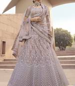 Enthralling Lilac Thread ans sequins embroidered net fabric  Lehenga designs