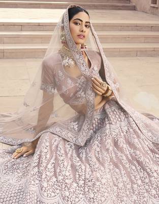 Enthralling Lilac Thread ans sequins embroidered net fabric  Lehenga designs 2