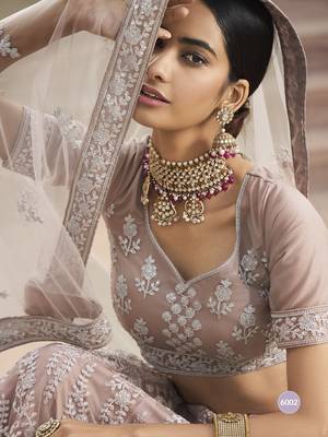 Enthralling Lilac Thread ans sequins embroidered net fabric  Lehenga designs 4