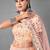 Peach embroidered net Semi Stitched bridal lehenga