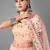 Peach embroidered net Semi Stitched bridal lehenga
