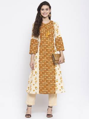 Mustard printed cotton kurtas-and-kurtis 5