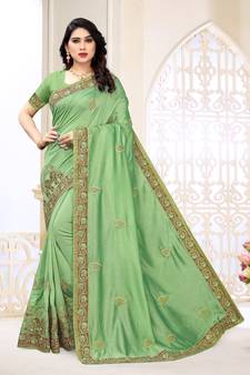 Light green embroidered silk saree with blouse
