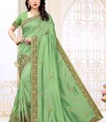 Light green embroidered silk saree with blouse