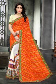 Orange embroidered georgette saree with blouse