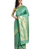 green woven kanchipuram silk saree with blouse