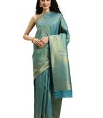 green woven  silk saree with blouse