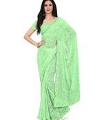Green woven net saree with blouse