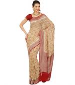 Beige woven georgette saree with blouse