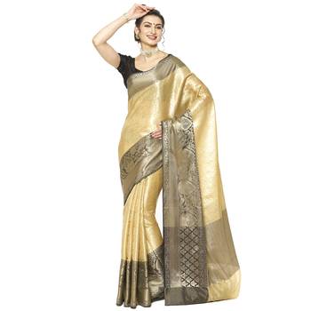 Beige woven kanchipuram silk blend saree with blouse 1