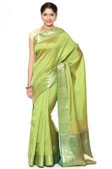Green woven katan silk saree with blouse