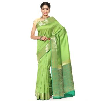 Green woven katan silk saree with blouse 1