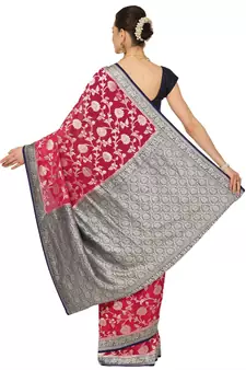 Pink woven georgette saree with blouse