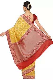 Yellow woven georgette saree with blouse