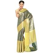 Green woven art silk saree with blouse