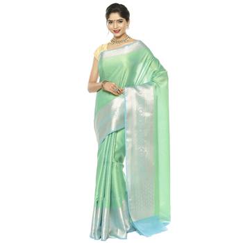 Green woven art silk saree with blouse 1
