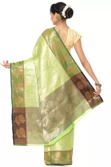 Green woven art silk saree with blouse