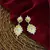 Sangeeta Boochra Silver Earrings With Gold Plating
