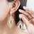 Sangeeta Boochra Silver Earrings With Gold Plating