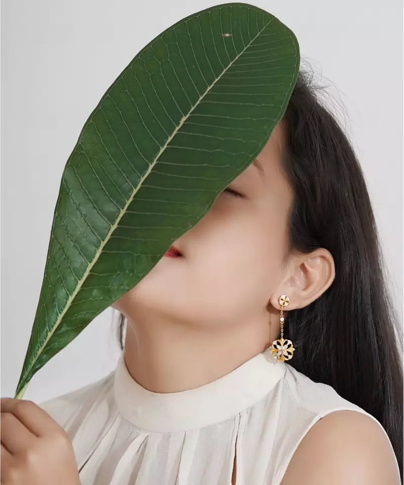 Sangeeta Boochra Silver Earrings With Gold Plating