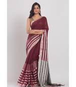 Maroon linen saree with silver zori pallu and border