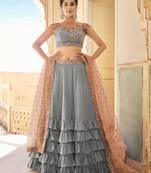 Brown Colour Strech Jersy Layered Lehenga with Matching Net Cutwork Dupatta Paired with Same Colour Satin Silk Blouse
