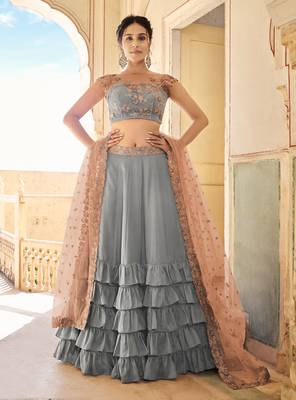 Brown Colour Strech Jersy Layered Lehenga with Matching Net Cutwork Dupatta Paired with Same Colour Satin Silk Blouse 5