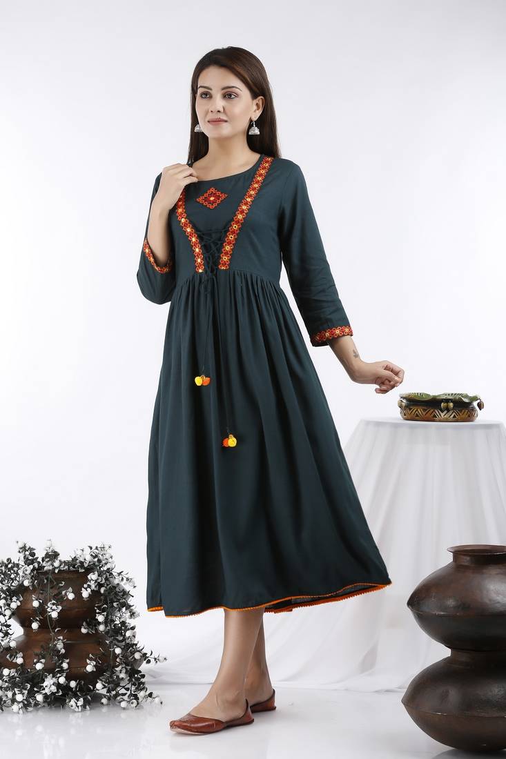 Women Embroidered Solid Rayon Slub Flared Kurta