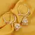 Gold pearl earrings