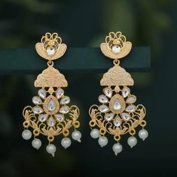 Gold pearl earrings 1