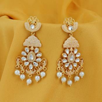 Gold pearl earrings 3