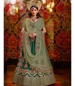 green handloom silk lehenga with resham and zari work having light green net embroidered dupatta