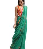 Green embroidered silk_blend saree with blouse