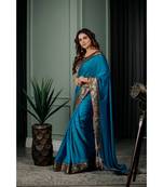 shraddha arya turquoise woven silk  saree