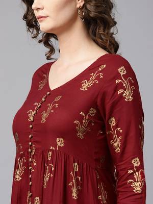 Women Maroon & Golden Printed A Line Kurta 4