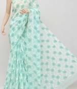 Dark aqua blue embroidered georgette saree with blouse