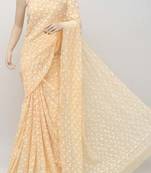 Orange embroidered georgette saree with blouse