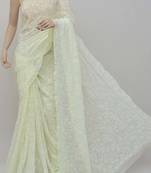 Yellow embroidered georgette saree with blouse