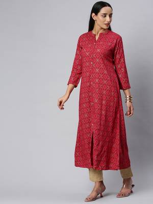 Fuchsia And Gold Geometric Printed A Line Kurta With quarter Sleeves. 3