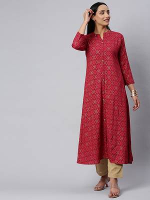 Fuchsia And Gold Geometric Printed A Line Kurta With quarter Sleeves. 5