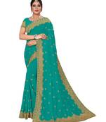 Aqua blue embroidered pure georgette saree with blouse