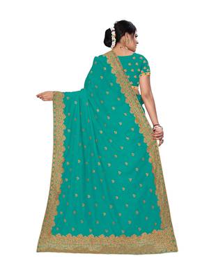 Aqua blue embroidered pure georgette saree with blouse 3