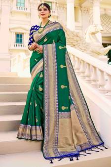 Green woven silk saree with blouse